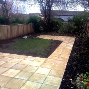 A new lawn is created with a wrap-around patio providing improved accessibility for all.